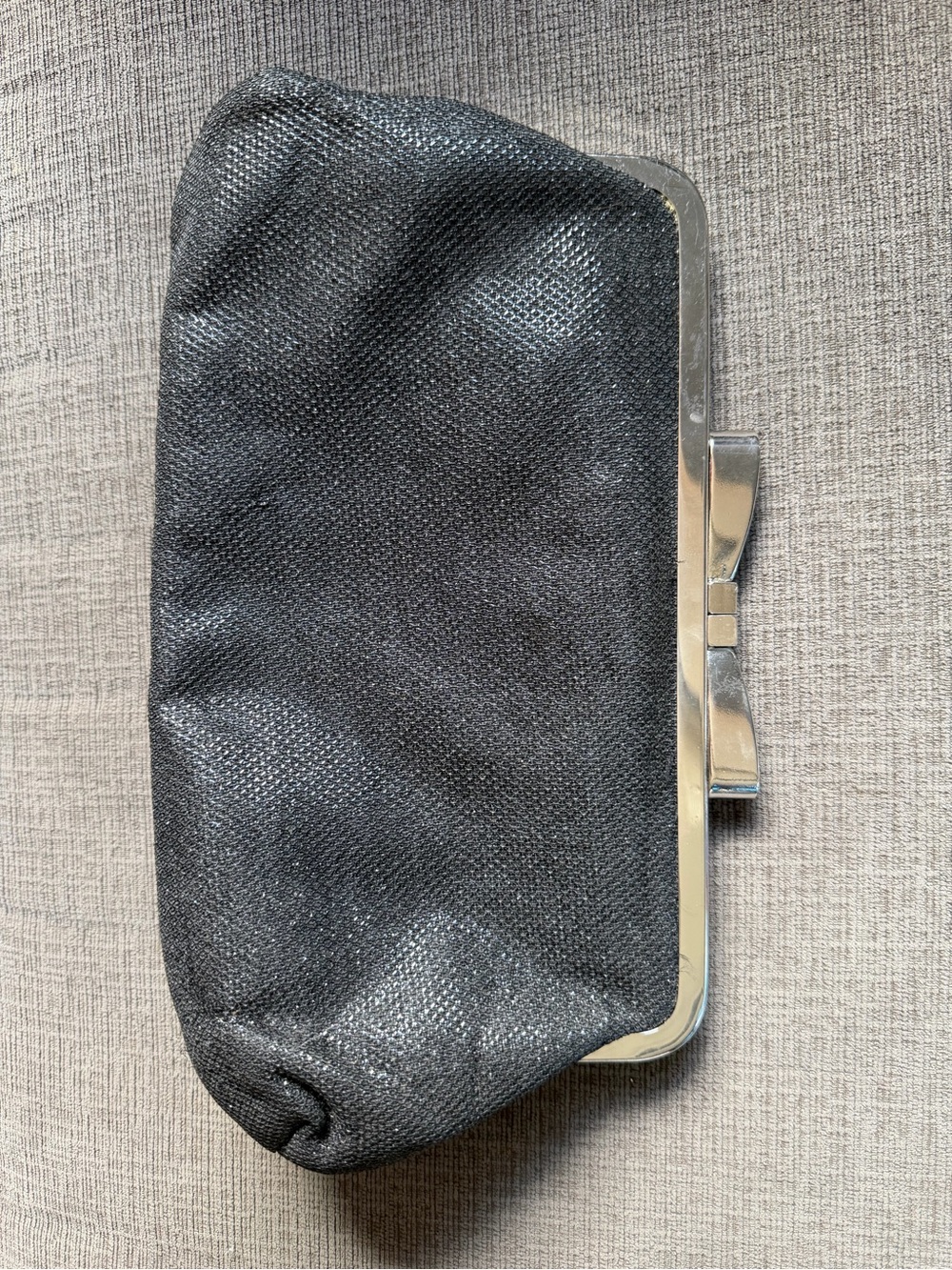 Black Textured Clutch with Silver Frame and Bow Accent